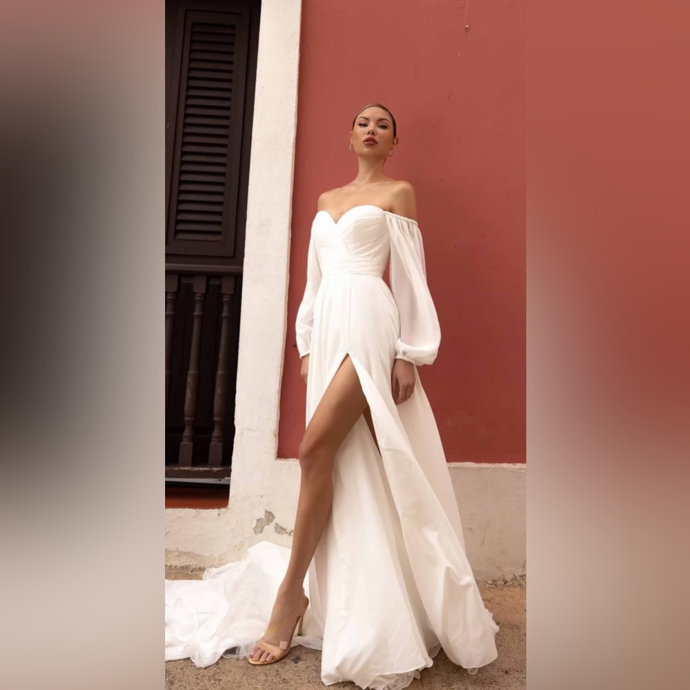 Elegant Chiffon Ivory A-Line Off-Shoulder long sleeves bridal Gown. Size 16